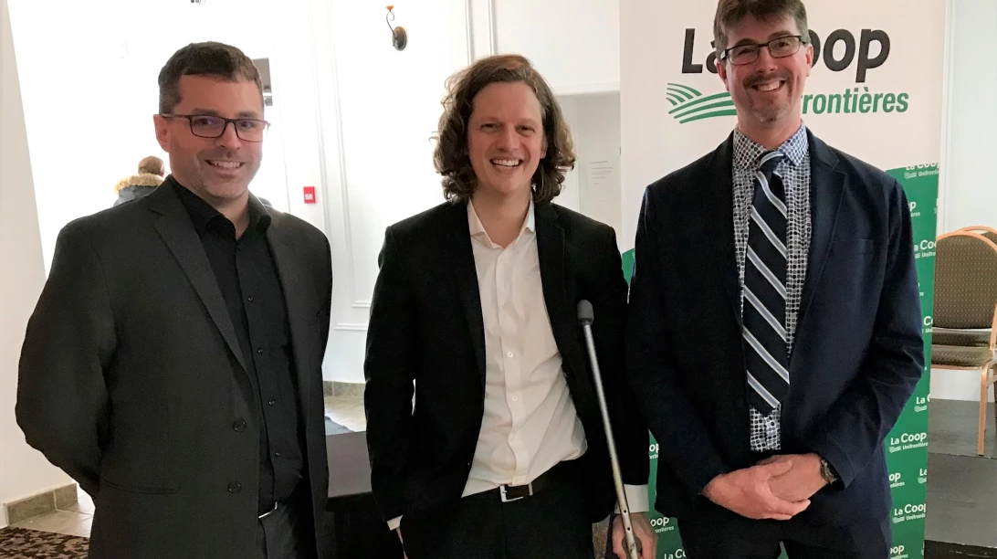 Trois membres de La Coop Unifrontières.
