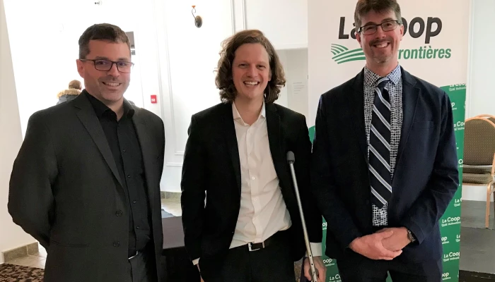 Trois membres de La Coop Unifrontières.