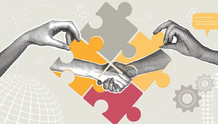Illustration de main se serrant avec des morceaux de casse-tête en fond
